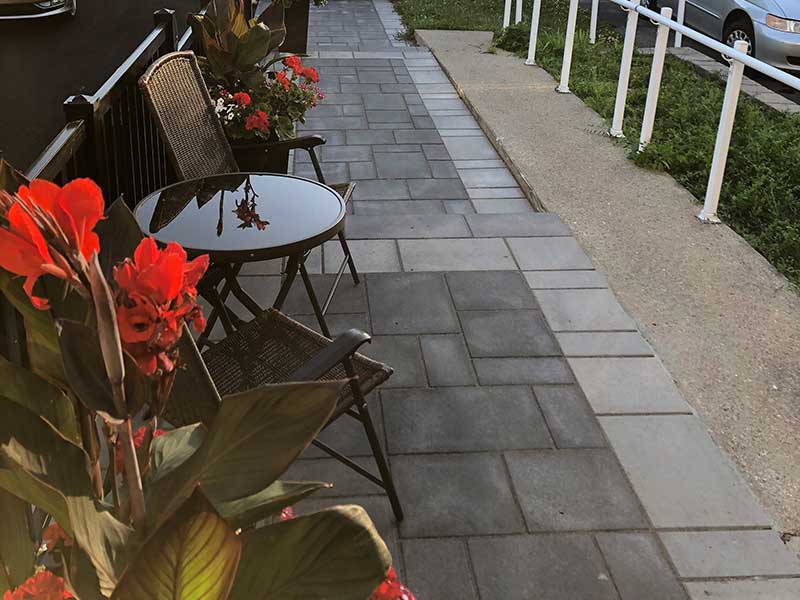 Amazing paver design at the entrance of a house