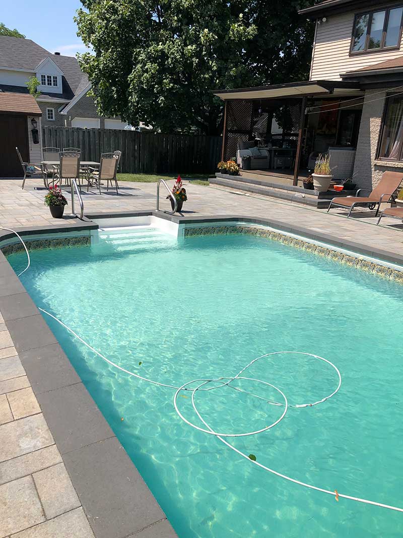 Clean paver design around a pool