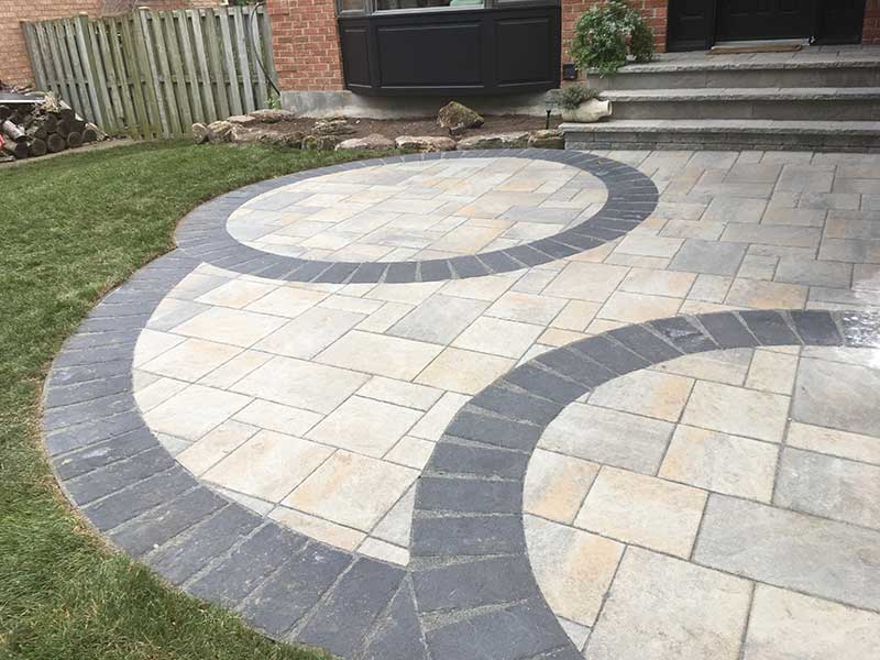 Beautiful paver design at the entrance of a house